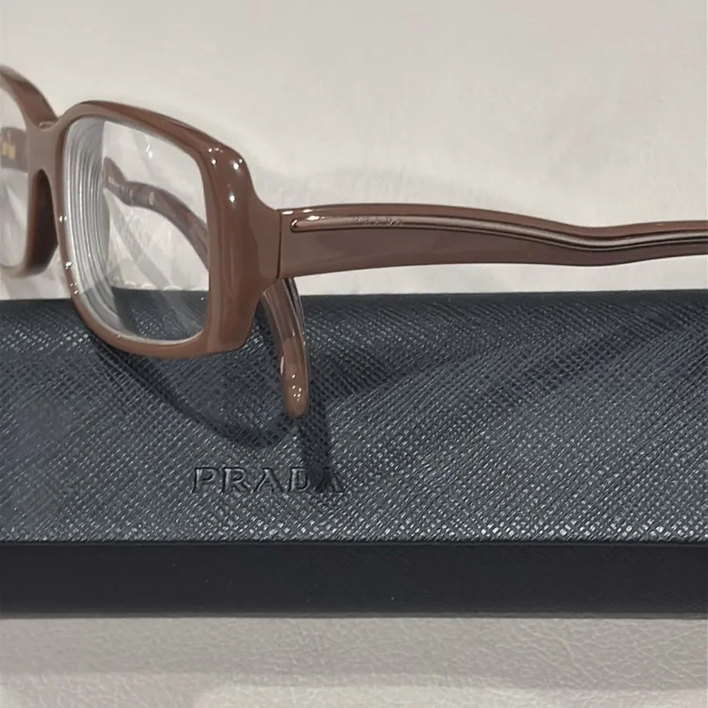 PRADA VPR06M Eyeglasses in color Hazelnut Mordore